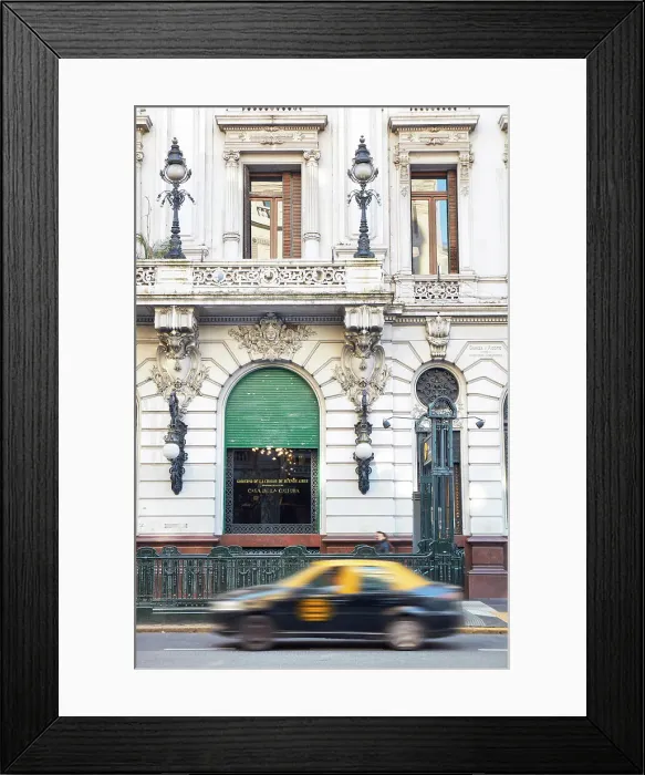 Framed Print : A city taxi passing by the main facade of La Prensa building (Casa de la Cultura), Avenida de Mayo, Monserrat, Buenos Aires, Argentina Framed Print : A city taxi passing by the main facade of La Prensa building (Casa de la Cultura), Avenida de Mayo, Monserrat, Buenos Aires, Argentina
