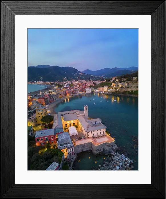 Framed Print : Aerial view of illuminated Sestri Levante and its Baia del Silenzio at sunset, Genova, Liguria, Italy, Southern Europe Framed Print : Aerial view of illuminated Sestri Levante and its Baia del Silenzio at sunset, Genova, Liguria, Italy, Southern Europe