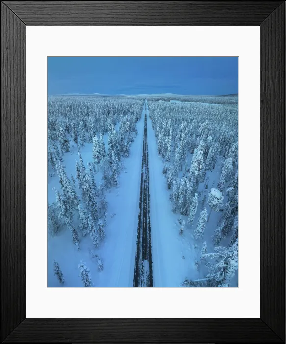 Framed Print : Aerial view of straight road during a winter evening in the Yllas-Pallastunturi National Park, Lapland, Finland Framed Print : Aerial view of straight road during a winter evening in the Yllas-Pallastunturi National Park, Lapland, Finland