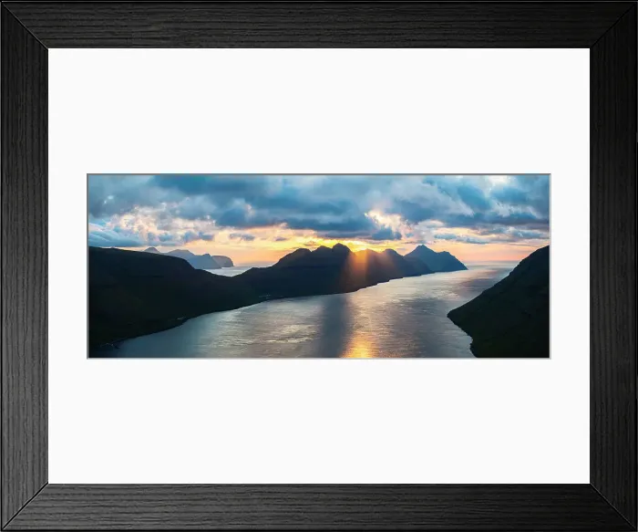 Framed Print : Silhouette of Kunoy island lit by sunset reflected in the sea from Klakkur mountain, Klaksvik, Bordoy island, Faroe Islands Framed Print : Silhouette of Kunoy island lit by sunset reflected in the sea from Klakkur mountain, Klaksvik, Bordoy island, Faroe Islands
