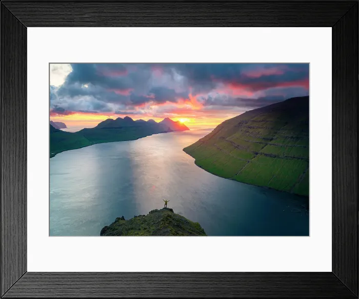 Framed Print : High angle view of cheerful hiker with arms outstretched watching sunset on mountain top, Klaksvik, Bordoy island, Faroe Islands Framed Print : High angle view of cheerful hiker with arms outstretched watching sunset on mountain top, Klaksvik, Bordoy island, Faroe Islands