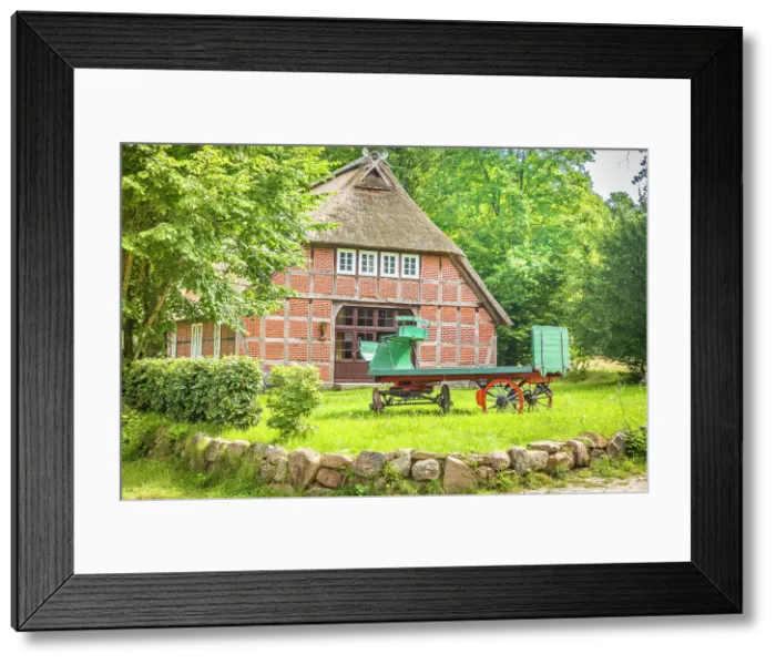 Framed Print : Traditional half-timbered farm in the village of Wilsede, Luneburg Heath, Lower Saxony, Germany Framed Print : Traditional half-timbered farm in the village of Wilsede, Luneburg Heath, Lower Saxony, Germany