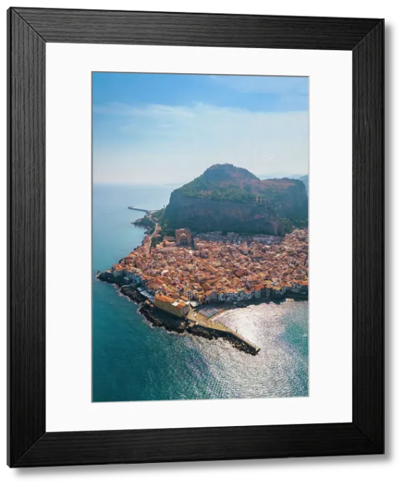 Framed Print : Aerial view of the ancient town of Cefalu, Unesco World Heritage site, at sunset. Palermo district, Sicily, Italy Framed Print : Aerial view of the ancient town of Cefalu, Unesco World Heritage site, at sunset. Palermo district, Sicily, Italy
