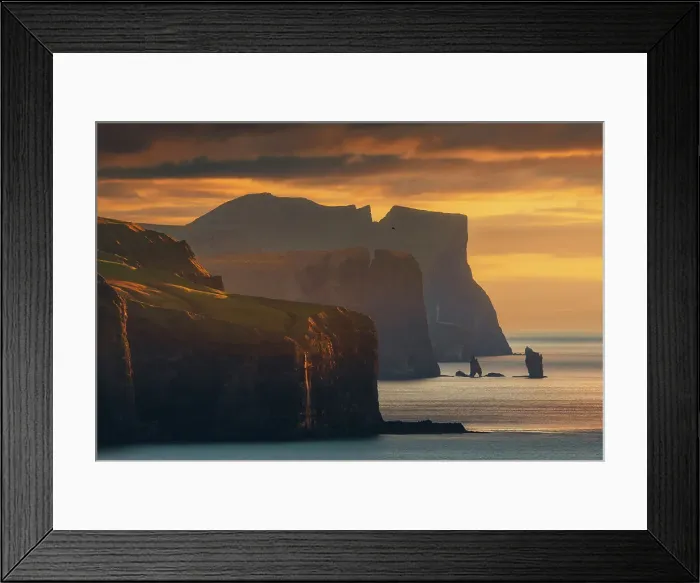 Framed Print : The coastline view from the Kallur Lighthouse over the northern cliffs towards the sea stacks of Risin og Kellingin. Faroe Islands Framed Print : The coastline view from the Kallur Lighthouse over the northern cliffs towards the sea stacks of Risin og Kellingin. Faroe Islands