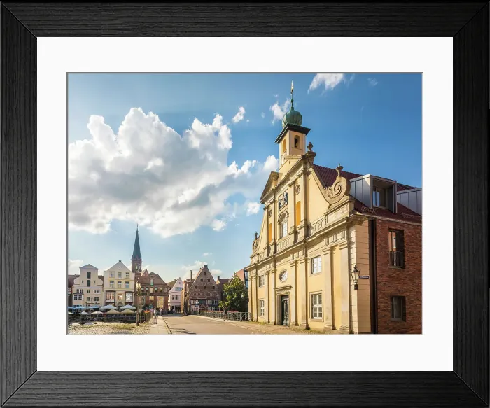 Framed Print : Old department store at the bridge over the Ilmenau, Luneburg, Lower Saxony, Germany Framed Print : Old department store at the bridge over the Ilmenau, Luneburg, Lower Saxony, Germany