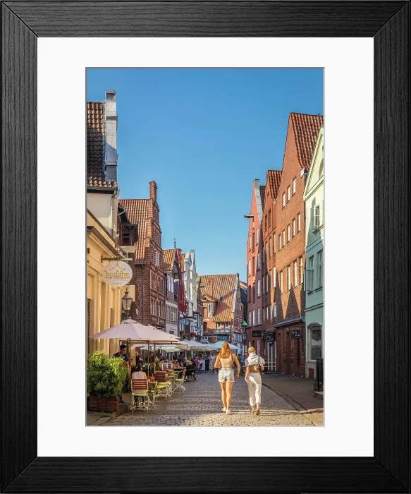 Framed Print : Stintmarkt in the old town with street restaurants, Luneburg, Lower Saxony, Germany Framed Print : Stintmarkt in the old town with street restaurants, Luneburg, Lower Saxony, Germany
