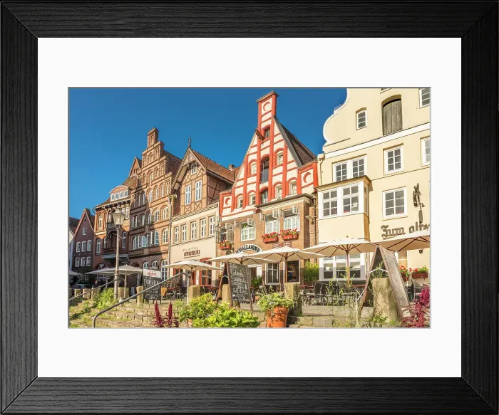 Framed Print : Row of houses at Am Stintmarkt with outdoor terraces, Luneburg, Lower Saxony, Germany Framed Print : Row of houses at Am Stintmarkt with outdoor terraces, Luneburg, Lower Saxony, Germany