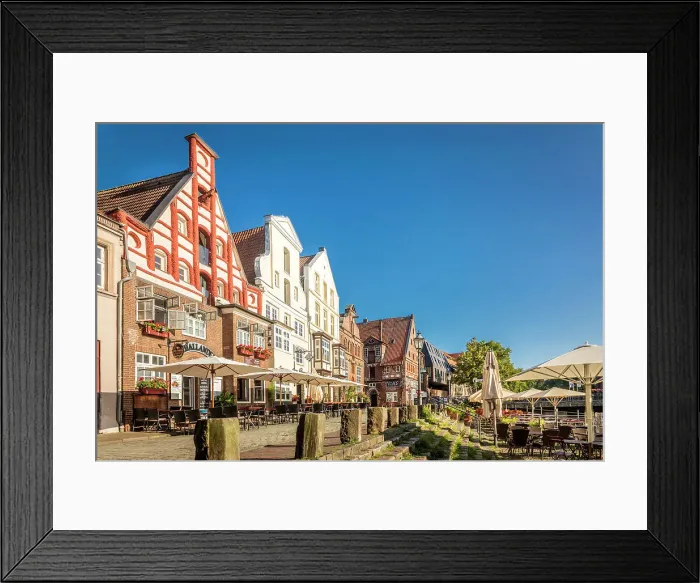 Framed Print : Row of houses at Am Stintmarkt with outdoor terraces, Luneburg, Lower Saxony, Germany Framed Print : Row of houses at Am Stintmarkt with outdoor terraces, Luneburg, Lower Saxony, Germany