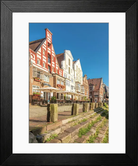 Framed Print : Row of houses at Am Stintmarkt with outdoor terraces, Luneburg, Lower Saxony, Germany