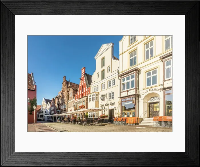 Framed Print : Row of houses at Am Stintmarkt with outdoor terraces, Luneburg, Lower Saxony, Germany