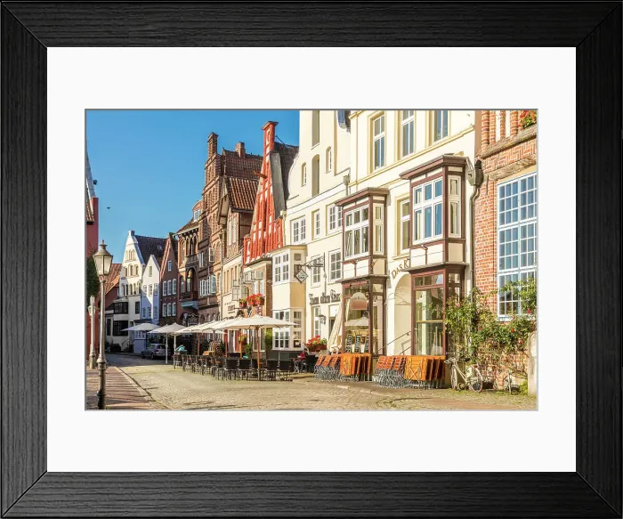 Framed Print : Row of houses at Am Stintmarkt with outdoor terraces, Luneburg, Lower Saxony, Germany Framed Print : Row of houses at Am Stintmarkt with outdoor terraces, Luneburg, Lower Saxony, Germany