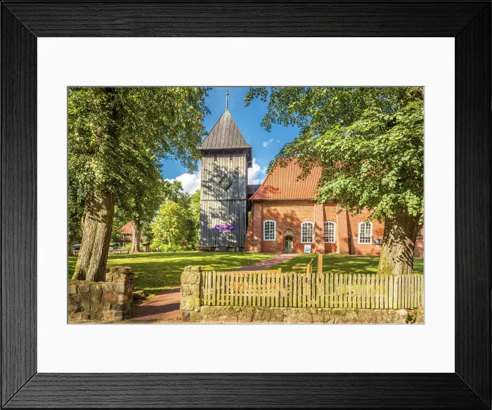 Framed Print : Parish church of Laurentius in the village of Mueden (Oertze), Luneburg Heath, Lower Saxony, Germany