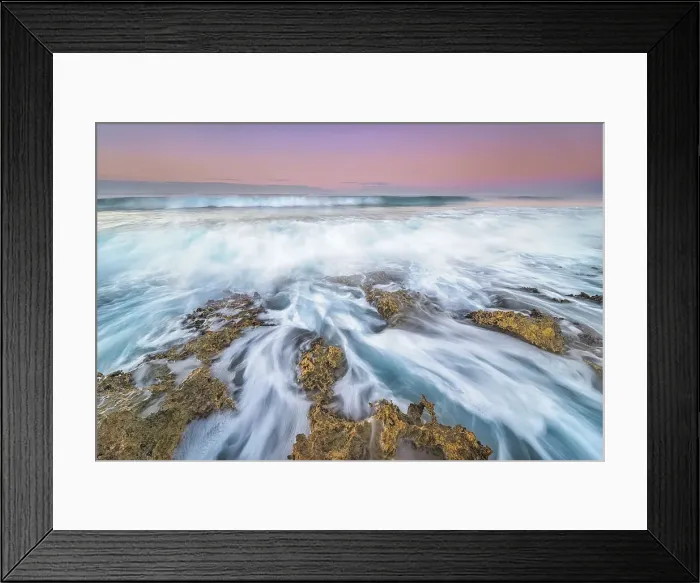 Framed Print : Daybreak on the Caribbean Sea along the rugged ironshore of Grand Cayman in the Cayman Islands, British West Indies Framed Print : Daybreak on the Caribbean Sea along the rugged ironshore of Grand Cayman in the Cayman Islands, British West Indies