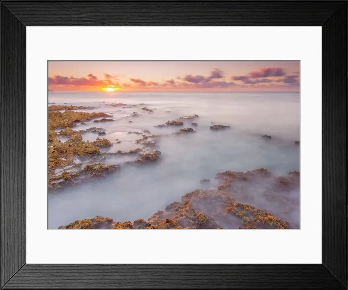 Framed Print : Daybreak on the Caribbean Sea along the rugged ironshore of Grand Cayman in the Cayman Islands, British West Indies Framed Print : Daybreak on the Caribbean Sea along the rugged ironshore of Grand Cayman in the Cayman Islands, British West Indies