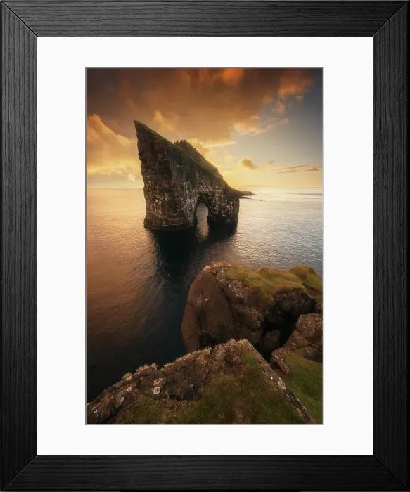 Framed Print : Colorful sunset behind the cliffs of Drangarnir after the storm cleared. Vagar, Faroe Islands Framed Print : Colorful sunset behind the cliffs of Drangarnir after the storm cleared. Vagar, Faroe Islands
