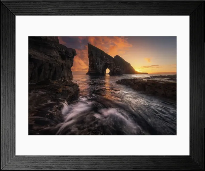 Framed Print : Colorful sunset behind the cliffs of Drangarnir after the storm cleared. Vagar, Faroe Islands Framed Print : Colorful sunset behind the cliffs of Drangarnir after the storm cleared. Vagar, Faroe Islands