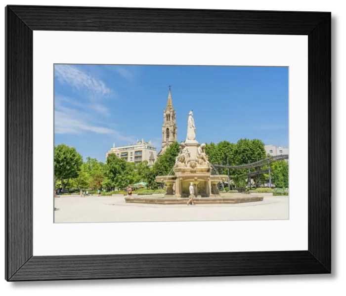 Framed Print : Pradier Fountain and the Church of Sainte Perprtue in the background, Nimes, Gard, France Framed Print : Pradier Fountain and the Church of Sainte Perprtue in the background, Nimes, Gard, France