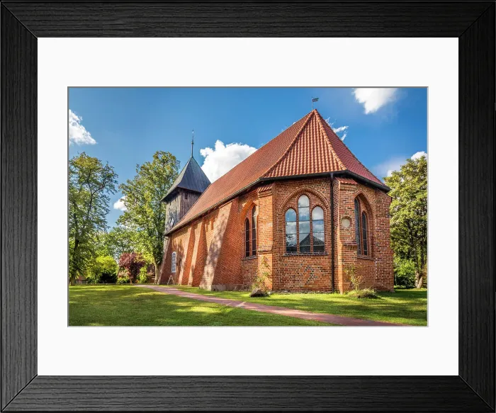 Framed Print : Parish church of Laurentius in the village of Mueden (Oertze), Luneburg Heath, Lower Saxony, Germany