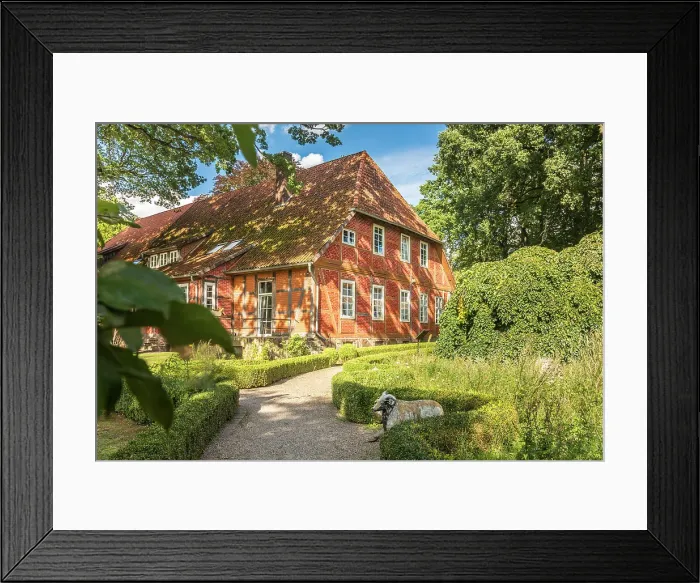 Framed Print : Historic brick half-timbered house in the village of Mueden (Oertze), Luneburg Heath, Lower Saxony, Germany Framed Print : Historic brick half-timbered house in the village of Mueden (Oertze), Luneburg Heath, Lower Saxony, Germany
