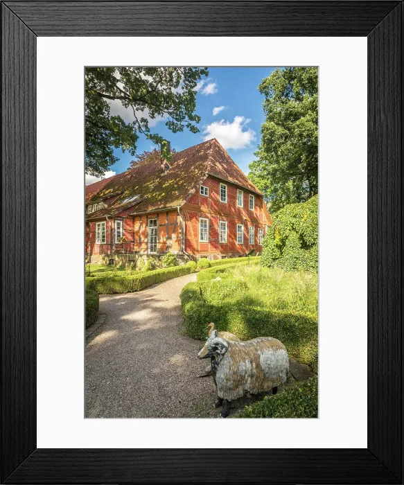 Framed Print : Historic brick half-timbered house in the village of Mueden (Oertze), Luneburg Heath, Lower Saxony, Germany Framed Print : Historic brick half-timbered house in the village of Mueden (Oertze), Luneburg Heath, Lower Saxony, Germany