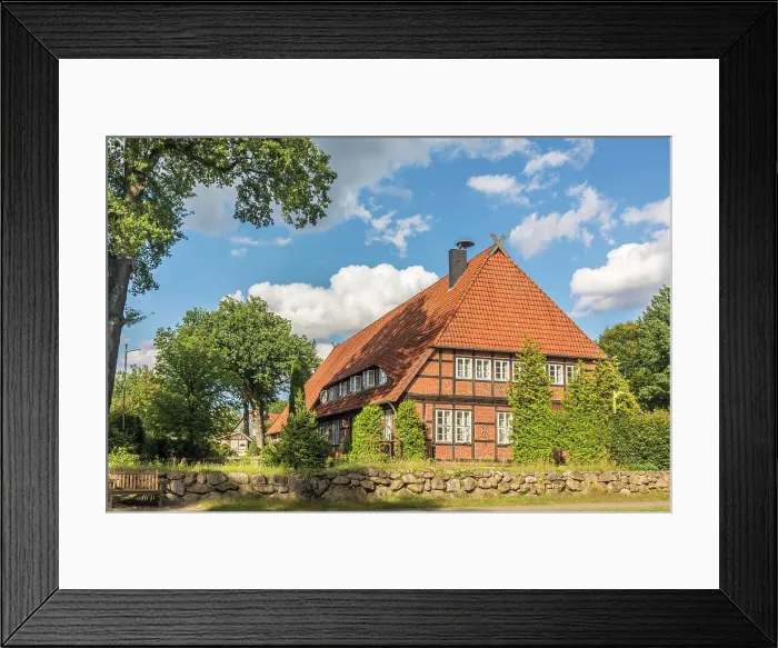 Framed Print : Large historic brick half-timbered farm in the village of Mueden (Oertze), Luneburg Heath, Lower Saxony, Germany Framed Print : Large historic brick half-timbered farm in the village of Mueden (Oertze), Luneburg Heath, Lower Saxony, Germany