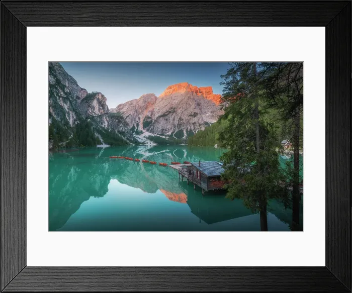 Framed Print : The Braies Lake with its iconic turquoise water color right after the snow-melting season. Dolomites, Italy Framed Print : The Braies Lake with its iconic turquoise water color right after the snow-melting season. Dolomites, Italy