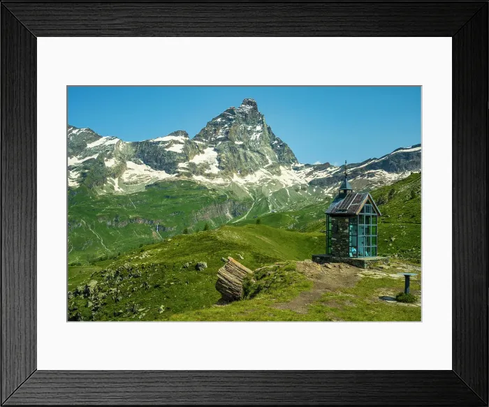 Framed Print : Europe, Italy, Aosta Valley. The iconic Matterhorn seen from a hiking path near to Breuil-Cervinia. In the foreground the little chapel Santa Anna Framed Print : Europe, Italy, Aosta Valley. The iconic Matterhorn seen from a hiking path near to Breuil-Cervinia. In the foreground the little chapel Santa Anna