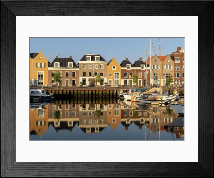 Framed Print : Houses along the old port reflected in the calm water, Harlingen, Friesland, Netherlands Framed Print : Houses along the old port reflected in the calm water, Harlingen, Friesland, Netherlands