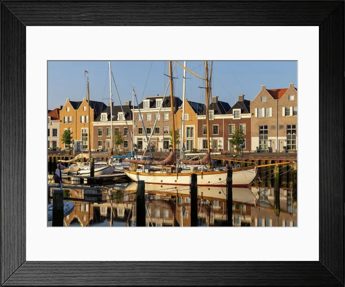 Framed Print : Houses along the old port reflected in the calm water, Harlingen, Friesland, Netherlands