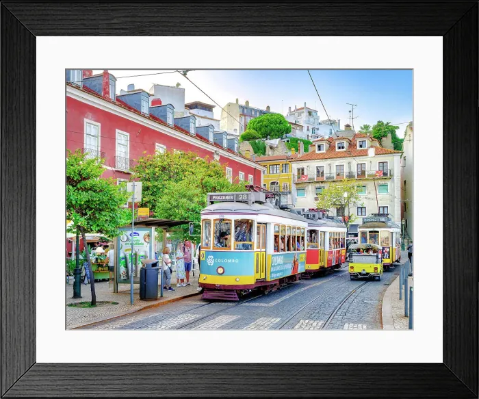 Framed Print : Hist√≥ric Alfama District, Street Scene with yellow Vintage Tram Number 28 Lisbon, Portugal