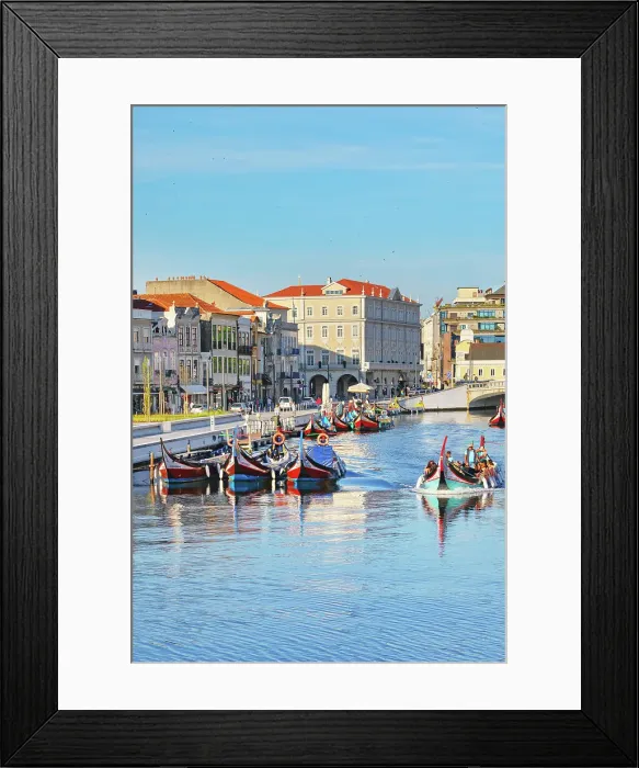 Framed Print : View of moliceiro boats floating on Aveiro river main lagoon, Aveiro, Portugal Framed Print : View of moliceiro boats floating on Aveiro river main lagoon, Aveiro, Portugal