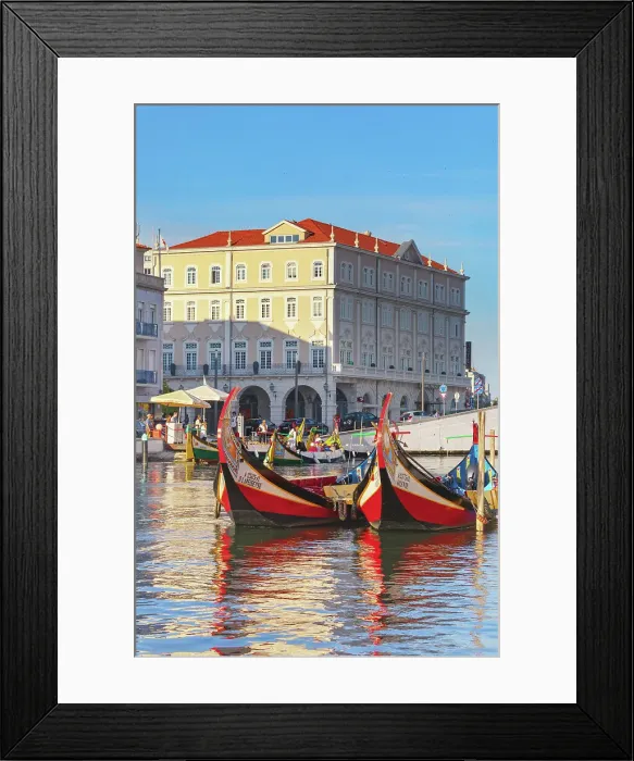 Framed Print : Moliceiro boats floating on Aveiro main canal, Aveiro, Portugal Framed Print : Moliceiro boats floating on Aveiro main canal, Aveiro, Portugal