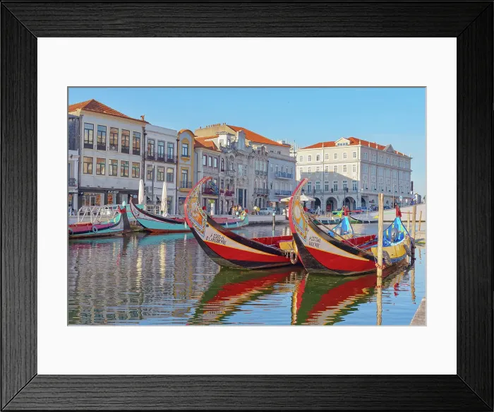 Framed Print : View of moliceiro boats floating on Aveiro river main lagoon, Aveiro, Portugal Framed Print : View of moliceiro boats floating on Aveiro river main lagoon, Aveiro, Portugal