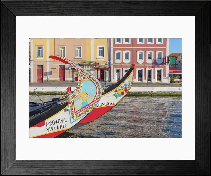 Framed Print : Moliceiro boats floating on Aveiro main canal, Aveiro, Portugal Framed Print : Moliceiro boats floating on Aveiro main canal, Aveiro, Portugal