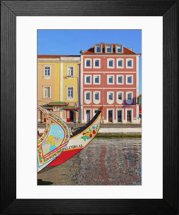 Framed Print : Moliceiro boats floating on Aveiro main canal, Aveiro, Portugal Framed Print : Moliceiro boats floating on Aveiro main canal, Aveiro, Portugal