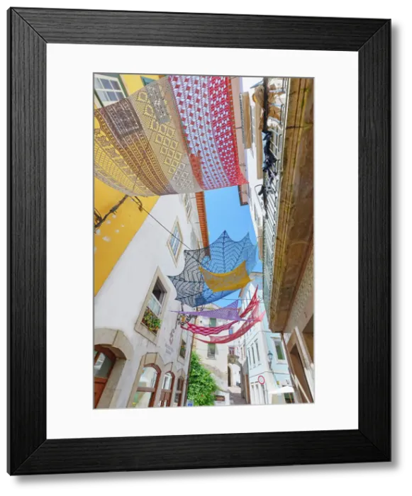 Framed Print : Old town street decorated with Portuguese artefacts, Coimbra, Coimbra district, Centro Region, Portugal Framed Print : Old town street decorated with Portuguese artefacts, Coimbra, Coimbra district, Centro Region, Portugal