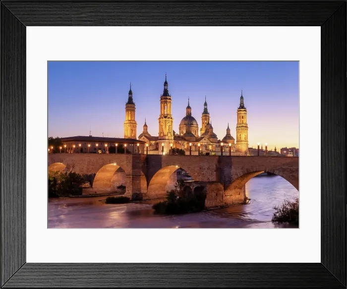 Framed Print : Puente de Piedra and Cathedral-Basilica of Our Lady of the Pillar along Ebro River at Sunset, Zaragoza, Aragon, Spain