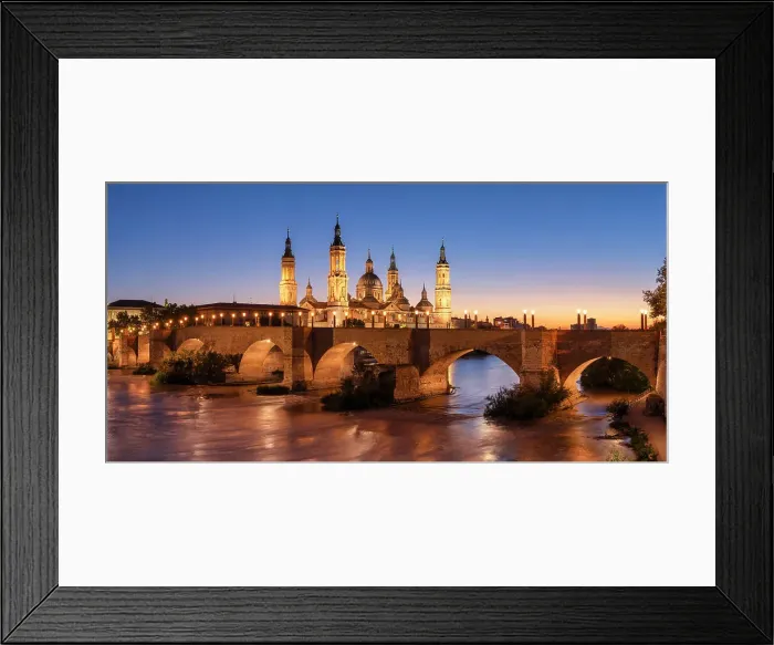 Framed Print : Puente de Piedra and Cathedral-Basilica of Our Lady of the Pillar along Ebro River at Sunset, Zaragoza, Aragon, Spain Framed Print : Puente de Piedra and Cathedral-Basilica of Our Lady of the Pillar along Ebro River at Sunset, Zaragoza, Aragon, Spain