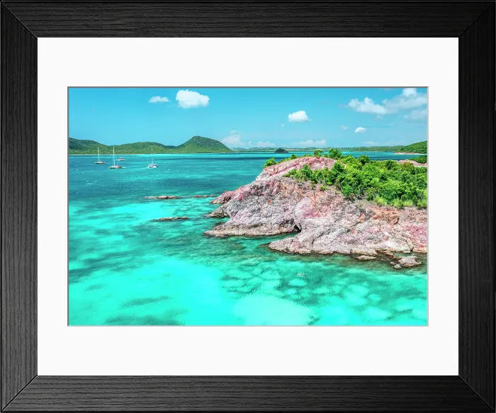 Framed Print : Aerial view of catamarans sailing in the blue sea offshore the red cliffs of Pearns Point, Antigua, Antigua & Barbuda, Caribbean Framed Print : Aerial view of catamarans sailing in the blue sea offshore the red cliffs of Pearns Point, Antigua, Antigua & Barbuda, Caribbean