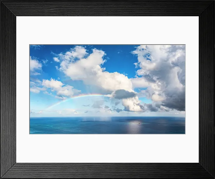 Framed Print : Aerial panoramic of fluffy clouds and colorful rainbow in the sky during a thunderstorm, Antigua, Antigua & Barbuda, Caribbean Framed Print : Aerial panoramic of fluffy clouds and colorful rainbow in the sky during a thunderstorm, Antigua, Antigua & Barbuda, Caribbean