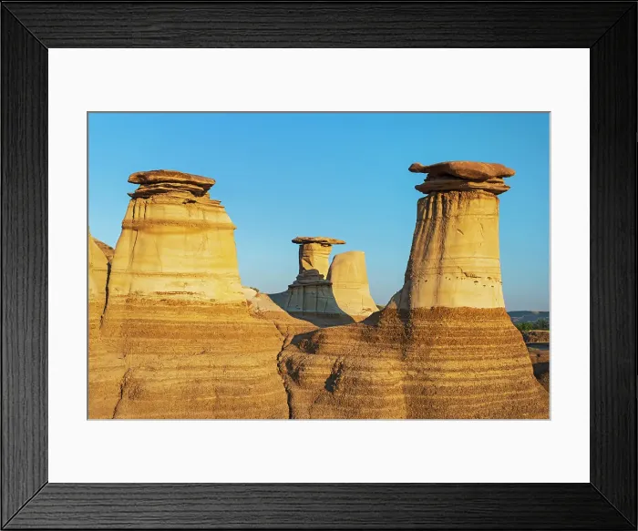 Framed Print : Badlands. Hoodoos at sunrise. East Coulee, Alberta, Canada