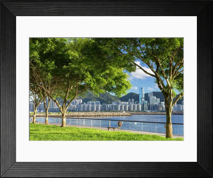 Framed Print : Kwun Tong promenade with Quarry Bay skyline in background, Hong Kong Island, Hong Kong Framed Print : Kwun Tong promenade with Quarry Bay skyline in background, Hong Kong Island, Hong Kong