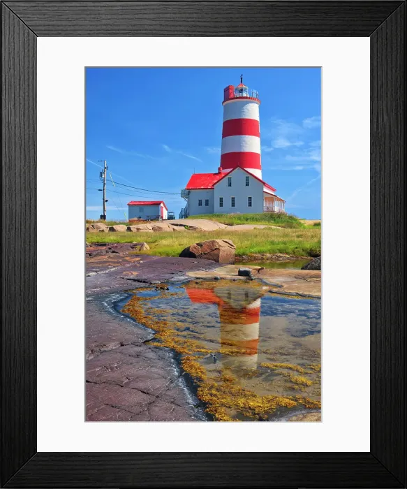 Framed Print : Pointe-des-Monts Lighthouse on the north shore of the St. Lawrence River Baie-Trinite, Quebec, Canada Framed Print : Pointe-des-Monts Lighthouse on the north shore of the St. Lawrence River Baie-Trinite, Quebec, Canada
