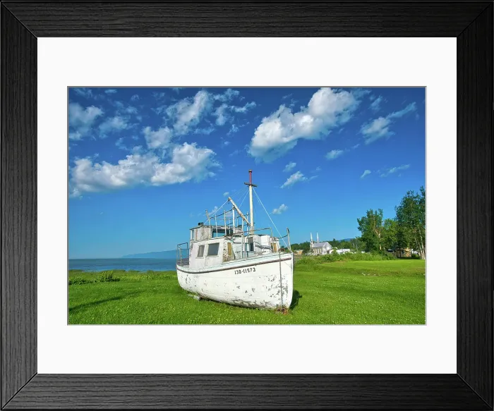 Framed Print : Old fishing boat on shore of St. Lawrence River, Quebec, Canada