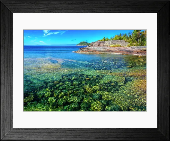 Framed Print : Sunlit rocks in Lake Superior shoreline at Coldwater Bay, Lake Superior Provincial Park, Ontario, Canada