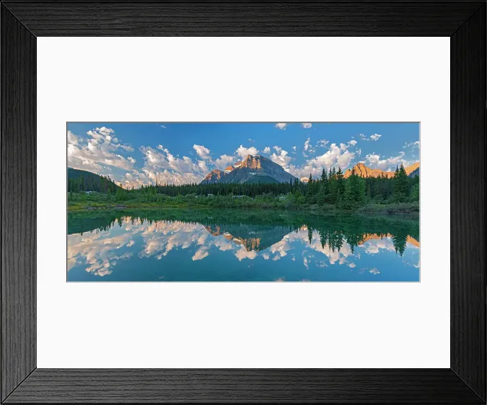 Framed Print : Panorama of Canadian Rocky Mountains reflected in a pond in the Silverhorne Creek Campground. Icefields Parkway. Possibly Mount Patterson in centre and Capricorn Mountain at right. Banff National Park, Alberta, Canada