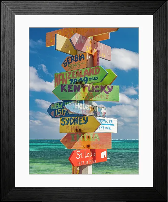 Framed Print : Fun directional sign post along the Caribbean Sea on Grand Cayman, Cayman Islands, British West Indies Framed Print : Fun directional sign post along the Caribbean Sea on Grand Cayman, Cayman Islands, British West Indies