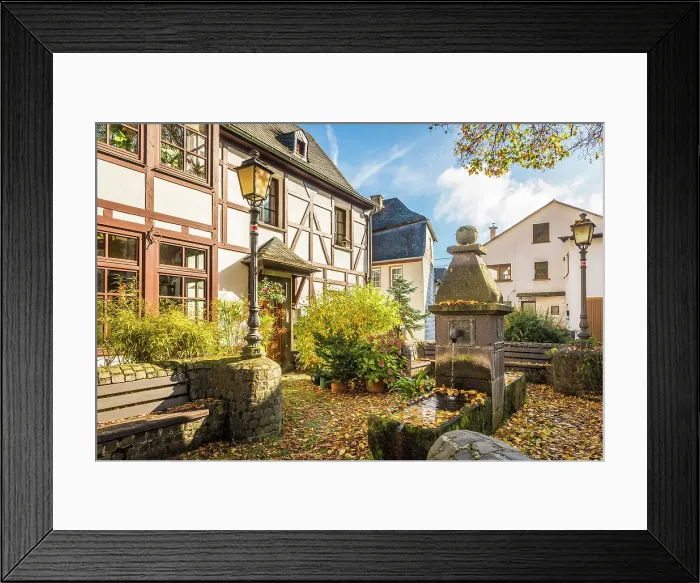 Framed Print : The old fountain with half-timbered houses in Bremm on the Mosel, Mosel, Rhineland-Palatinate, Germany Framed Print : The old fountain with half-timbered houses in Bremm on the Mosel, Mosel, Rhineland-Palatinate, Germany