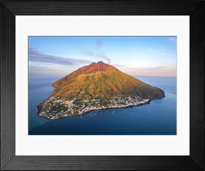 Framed Print : Stromboli village with black smoke rising from the crater of the volcano, Stromboli island, UNESCO World Heritage Site, Aeolian Islands, Sicily, Italy Framed Print : Stromboli village with black smoke rising from the crater of the volcano, Stromboli island, UNESCO World Heritage Site, Aeolian Islands, Sicily, Italy
