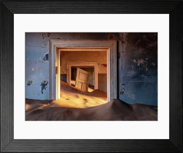 Framed Print : Rooms full of sand and suspended door in abandoned diamond mining town of Kolmanskop, Luderitz, Namib Desert, Namibia Framed Print : Rooms full of sand and suspended door in abandoned diamond mining town of Kolmanskop, Luderitz, Namib Desert, Namibia